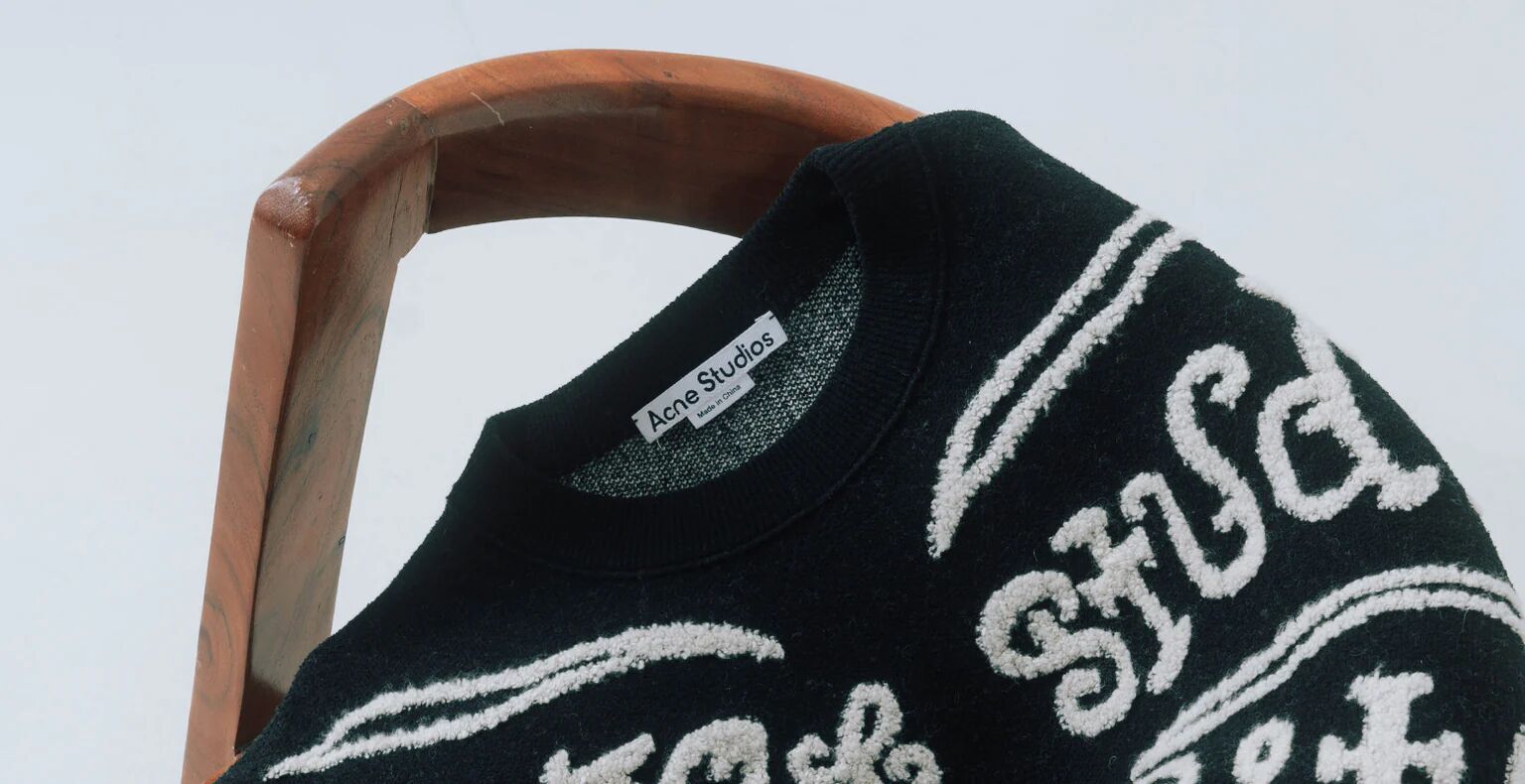 A close up of a Acne Studio's black sweater